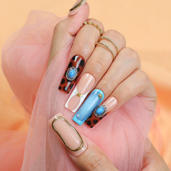 Acrylic nail set with luxurious design elements and creative accents Kalsten