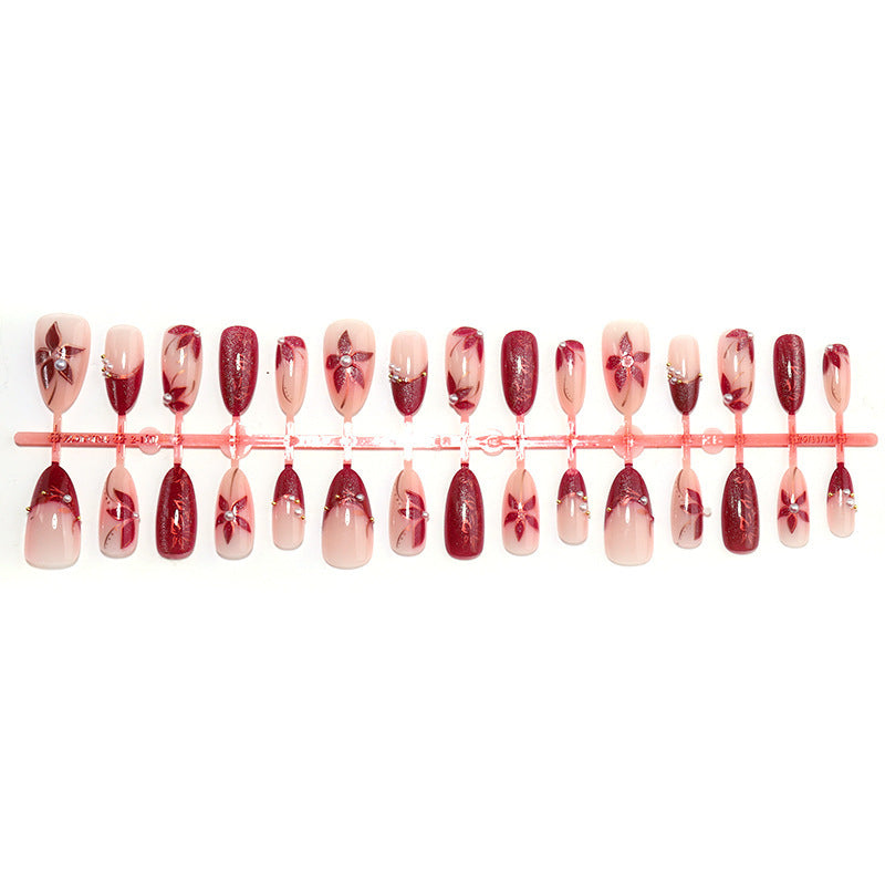 Glamorous artificial nail set with elegant floral and glitter details Kalsten
