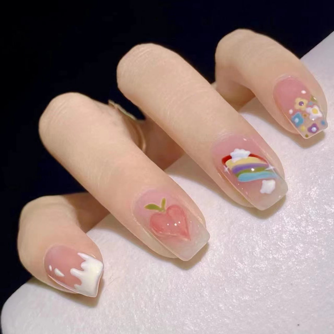 Creative nail art with fruit and flower motifs Kalsten