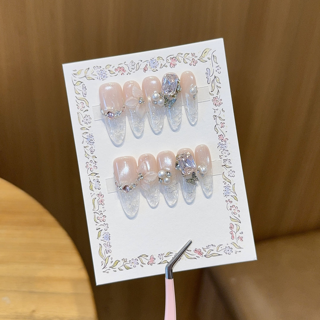 Artificial nails with delicate glitter and pearl decoration Kalsten