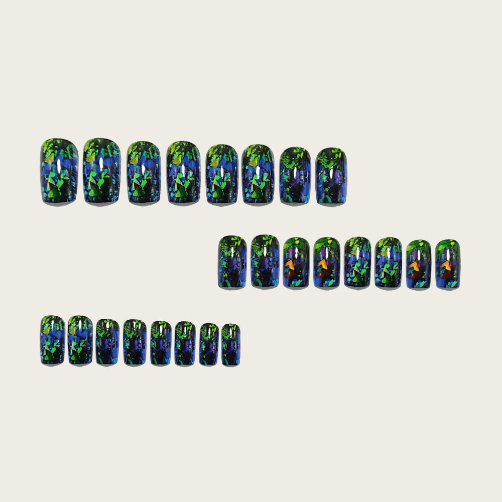 Artificial nails with sparkling glitter design and holographic accents Kalsten