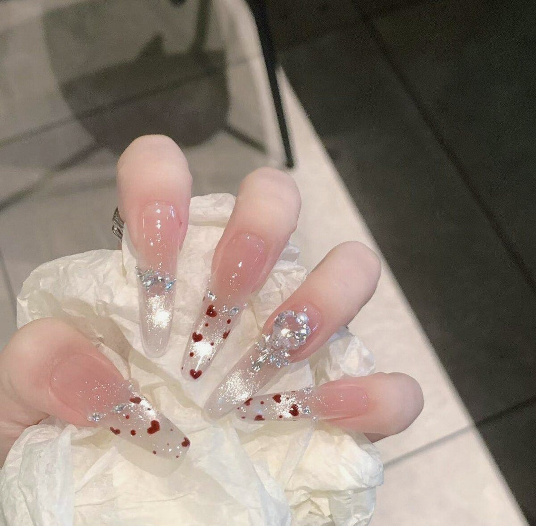 Artistic Stiletto Press-On Nail Art with Glimmering Accents Kalsten