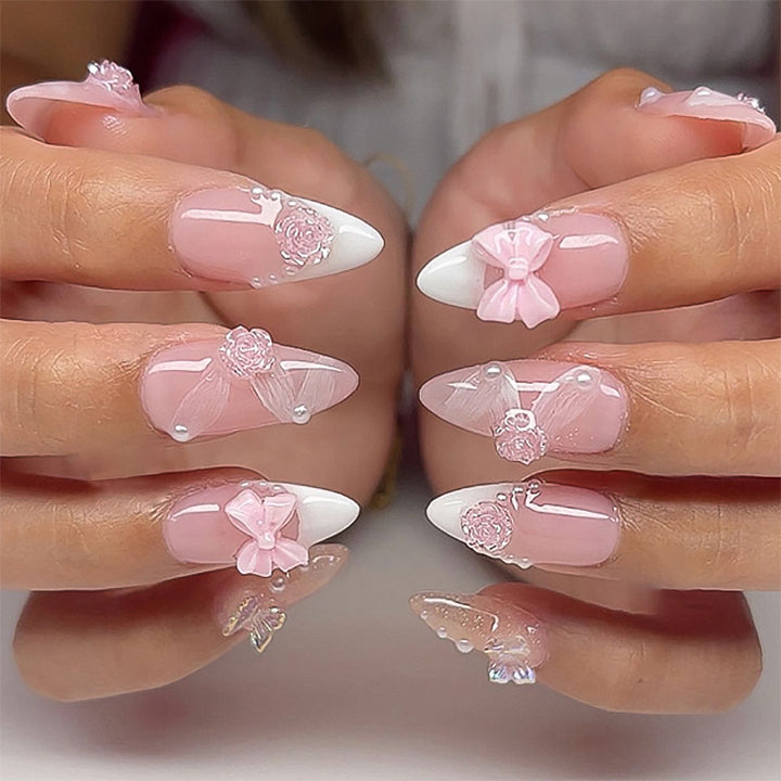 Artistic nail extensions with floral decorations and glitter accents Kalsten