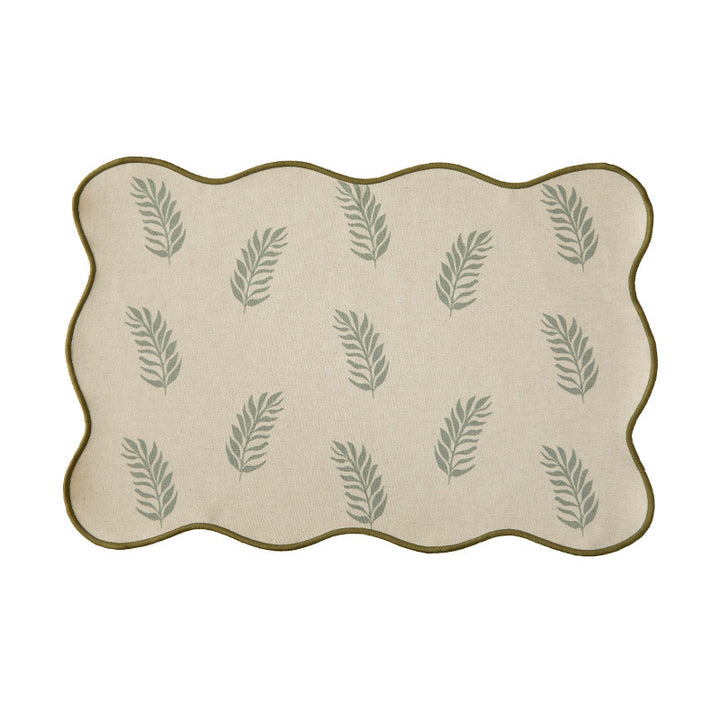 Shaped table set with curved contour and botanical leaf pattern Kalsten