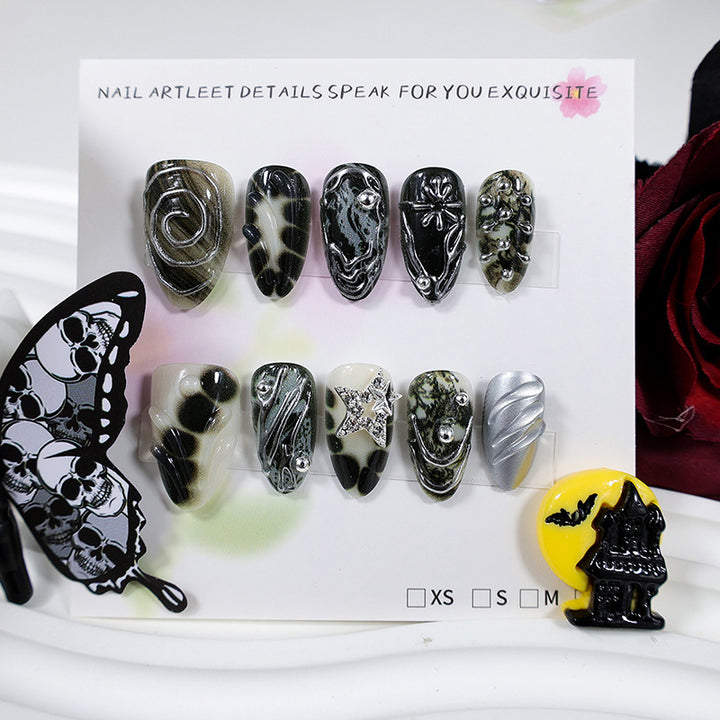 Art nail set with artistic patterns and glitter accents Kalsten
