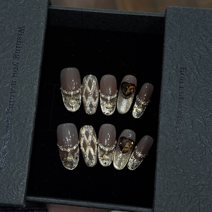 Glamorous artificial nails with glitter and heart design Kalsten