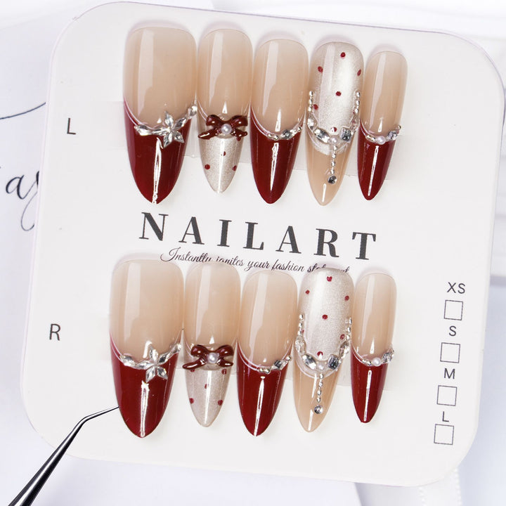 Artificial nails with glitter and tip accents Kalsten