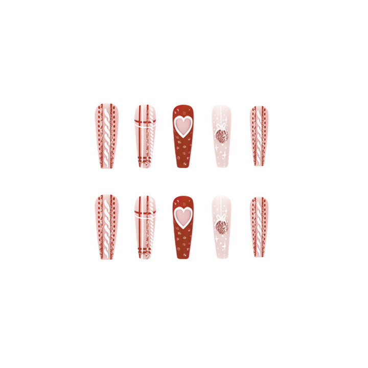 Artful nail art in festive design with heart and Christmas motifs Kalsten