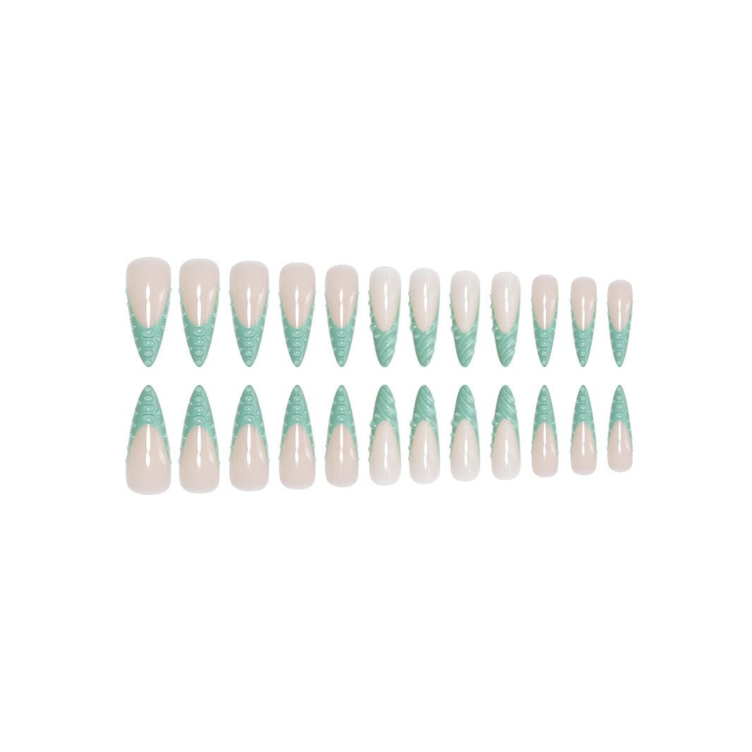 Artistic Stiletto Press-On Nail Design with 3D Shell Accents Kalsten