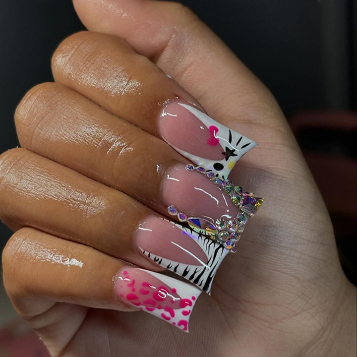Artistic Nail Art with Animal Motif and Rhinestone Decorations Kalsten