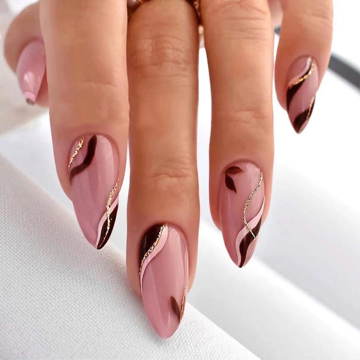 Artistic Nail Decoration with Gold Accents Kalsten