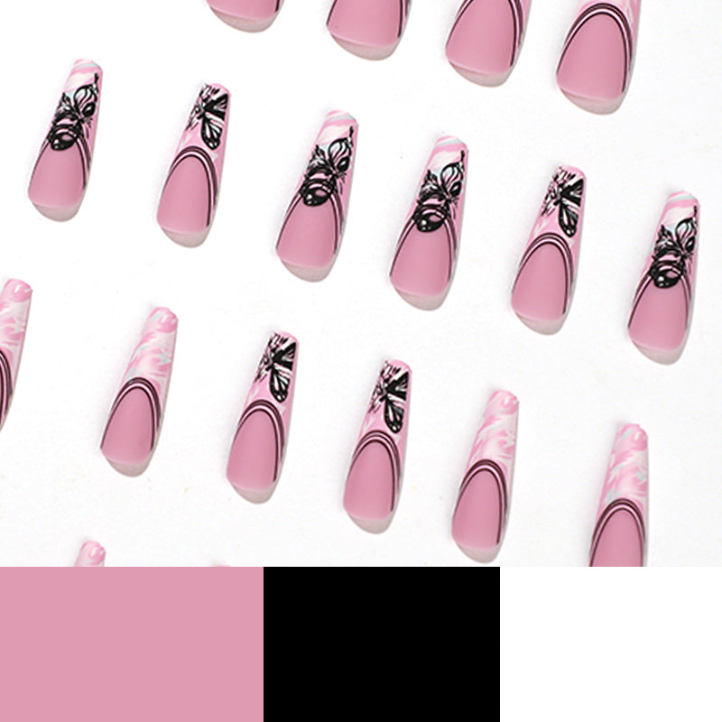 Artificial nail art with delicate butterfly designs Kalsten
