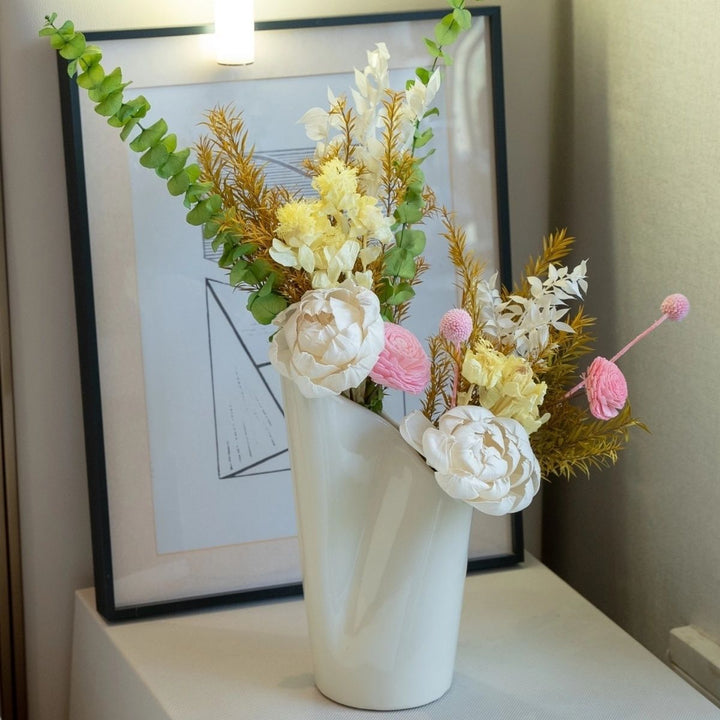 Elegant Dried Floral Arrangement in Contemporary Vase