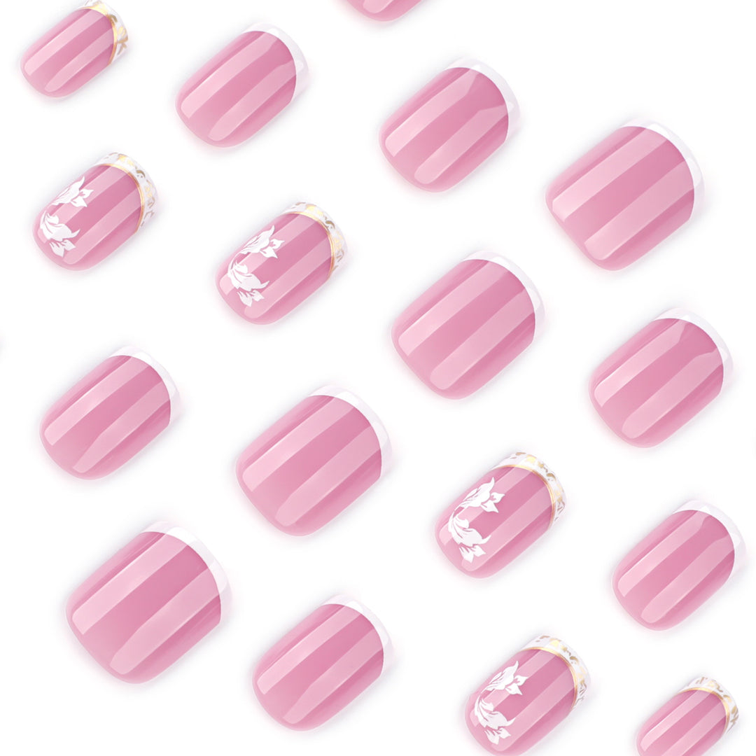 Artful nail art with elegant French tip and floral accents Kalsten