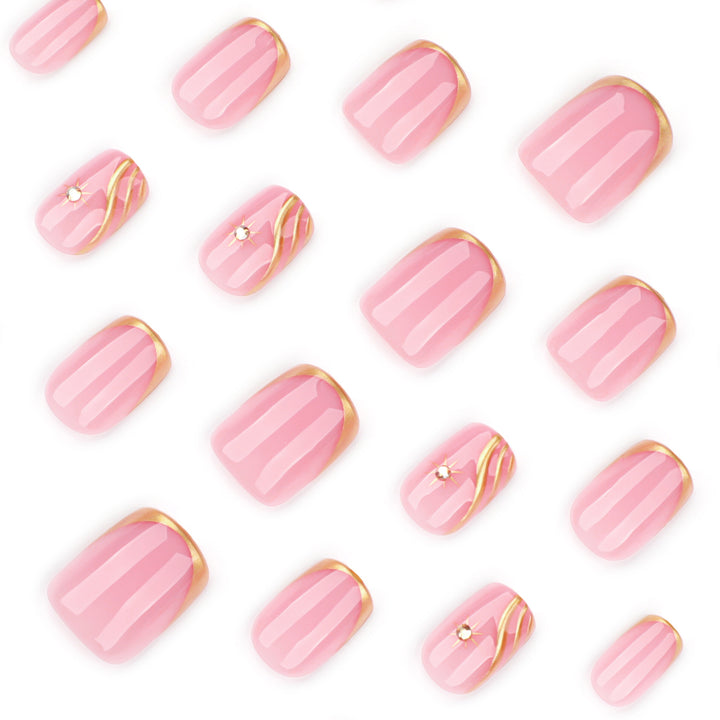 Artificial nail art with glamorous golden accents Kalsten