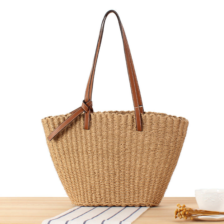 Beach bag made of handwoven natural material with sturdy leather straps Kalsten