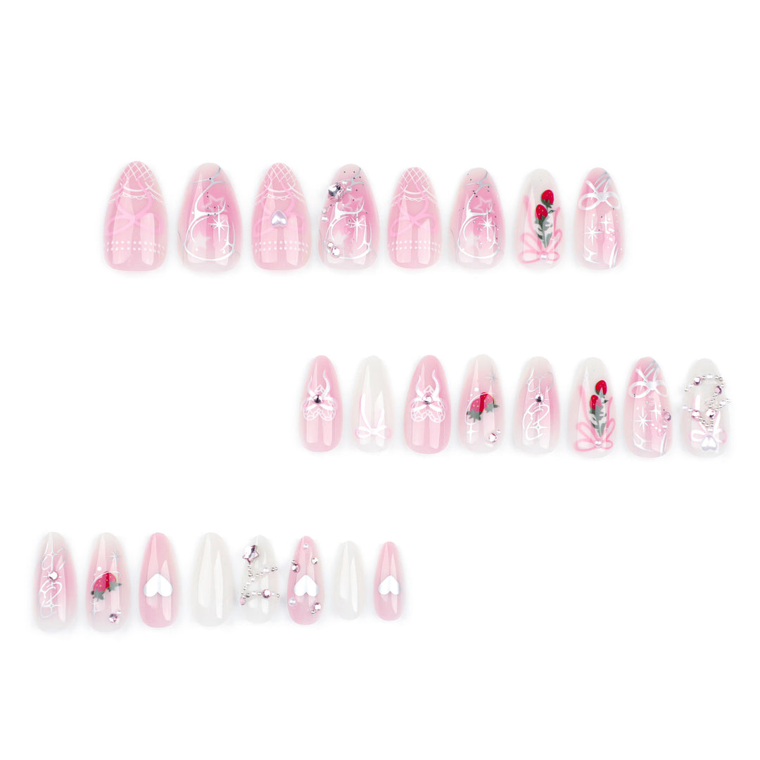 Artificial nail art with romantic design and glitter accents Kalsten