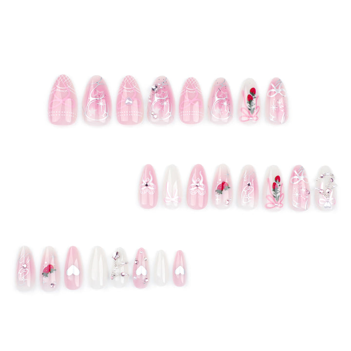 Artificial nail art with romantic design and glitter accents Kalsten