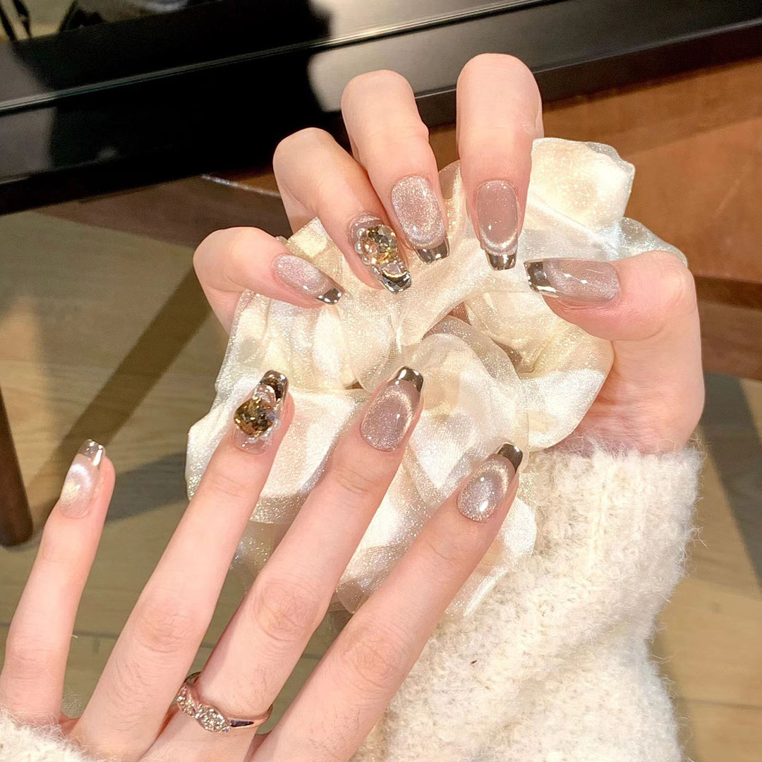 Artificial nail set with glamorous gold and glitter accents Kalsten