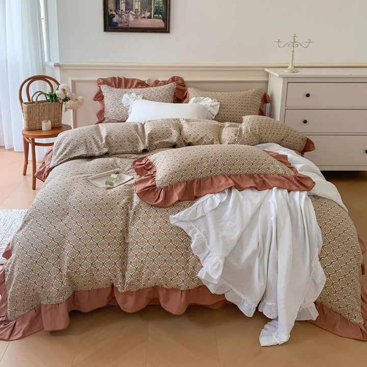 Romantic bed linen complete set made of cotton percale with delicate floral print, ruffle trim, and silky-matte finish