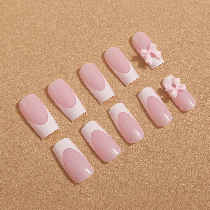 Art nail set with delicate bow decorations Kalsten