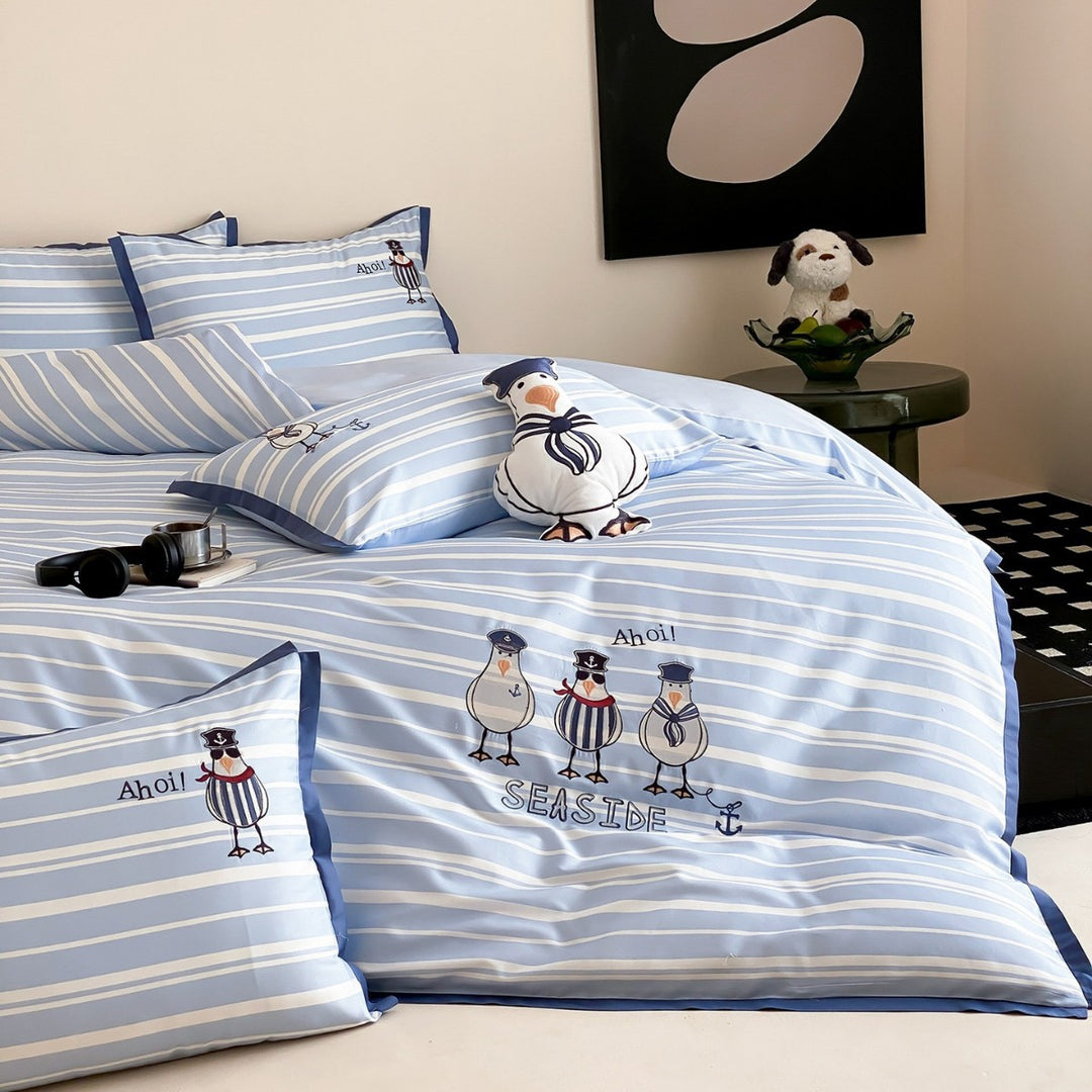 Maritime cotton satin bedding set with embroidered seagull motifs and fine stripe pattern