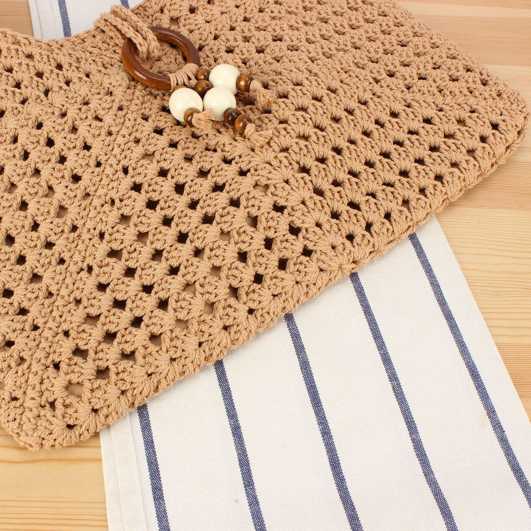 Handbag made of hand-knotted natural material with chic tassel decoration Kalsten