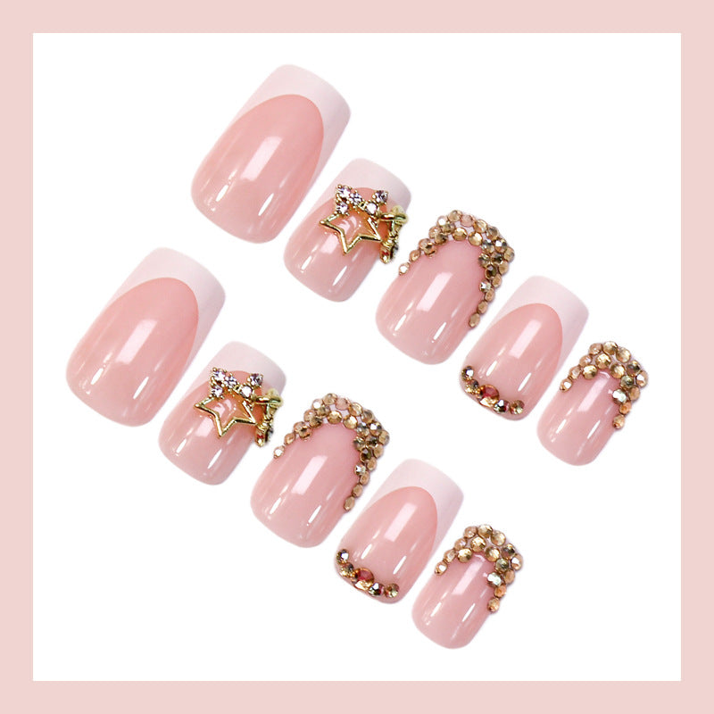 False nail set with glitter accents and holiday design Kalsten
