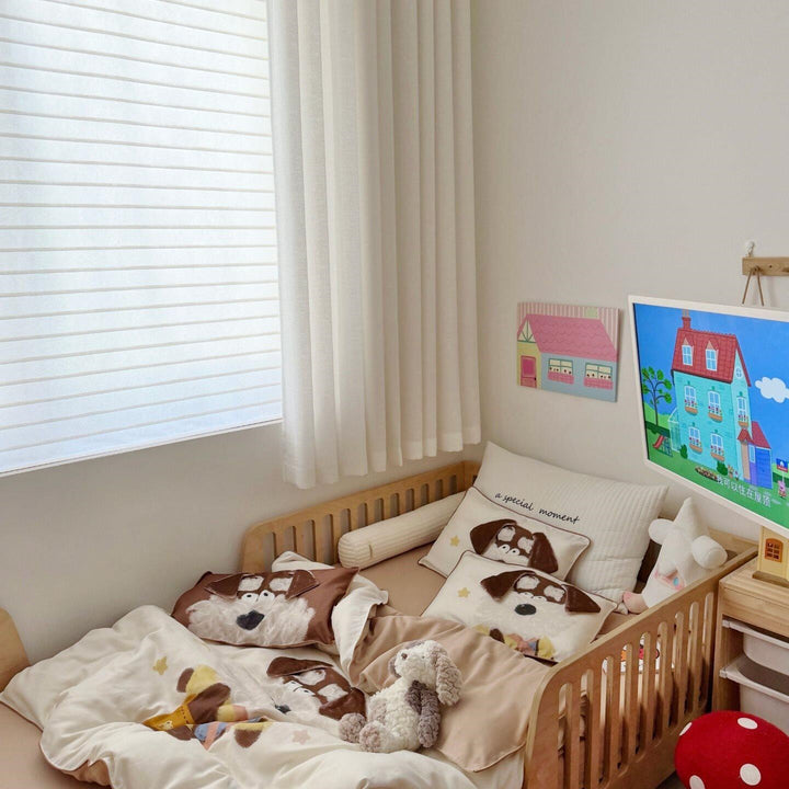 Children's bedding set with detailed dog appliqué, velvet trim, and soft muslin