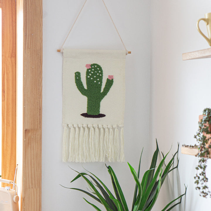 Woven cotton blend wall hanging with tufted cactus motif and cotton fringes Kalsten