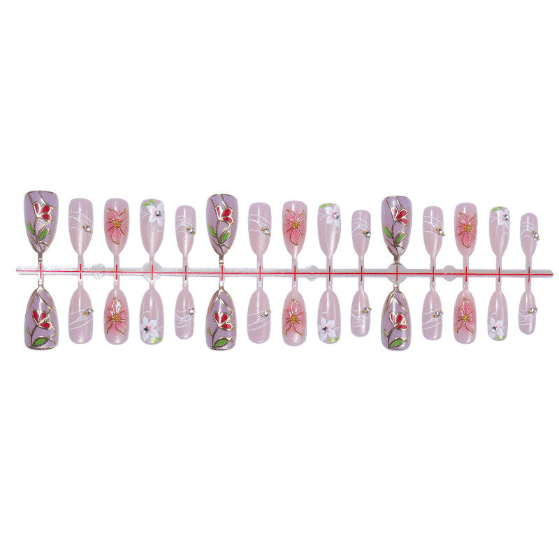 Nail art set with filigree floral decorations and shiny details Kalsten