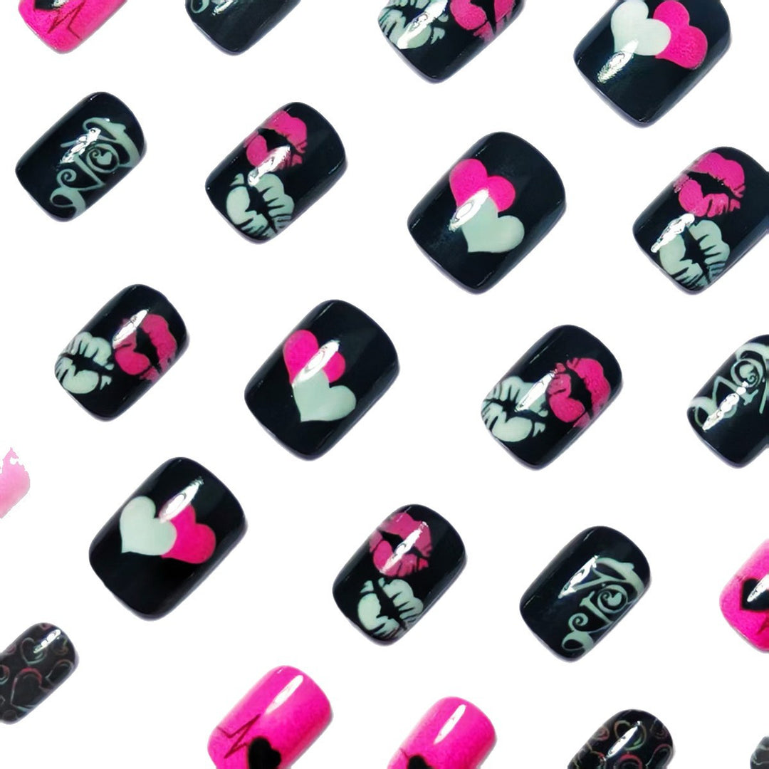 Acrylic nail design with hearts and kiss motifs Kalsten