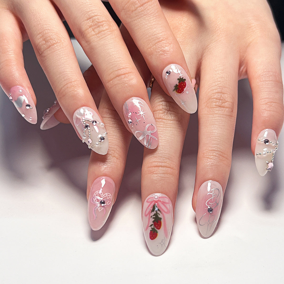 Artificial nail art with romantic design and glitter accents Kalsten