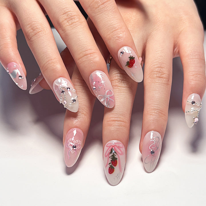 Artificial nail art with romantic design and glitter accents Kalsten