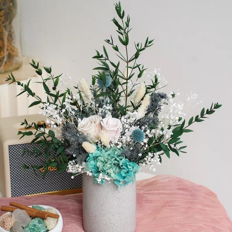 Dried Floral Arrangement in Modern Decorative Vase