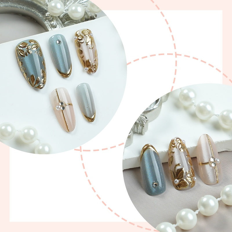 Artificial nail set with floral gold accents and elegant designs Kalsten