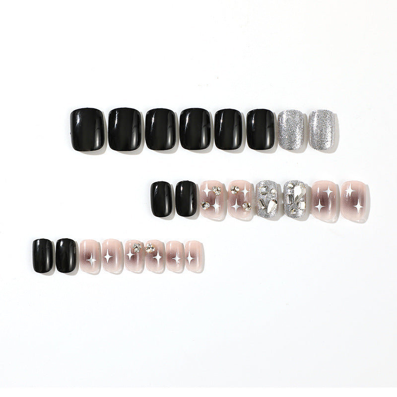 Elegant Nail Art with Glitter and Star Motifs Kalsten