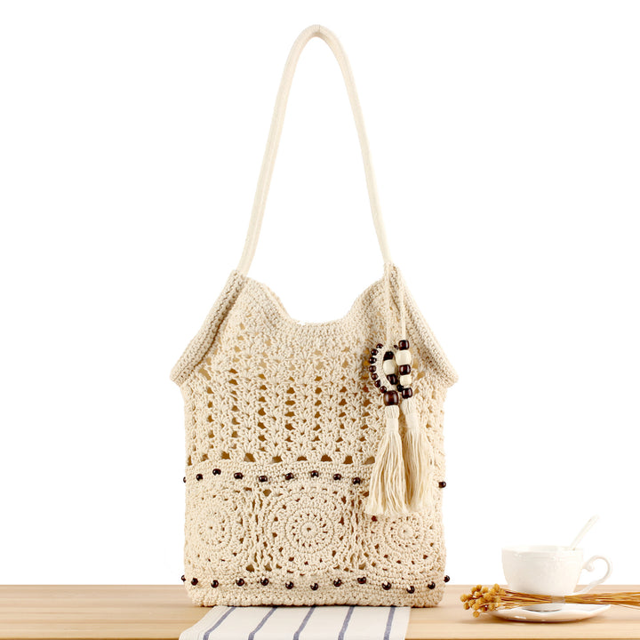 Hand-knotted macrame bag with playful pendant Kalsten