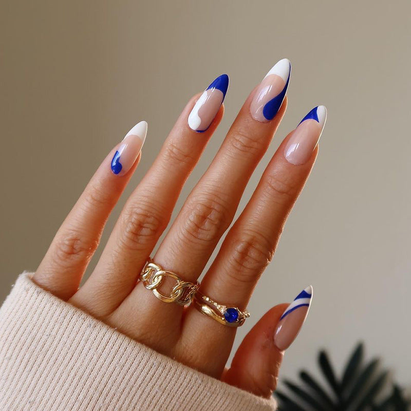 Artful nail extensions with an elegant leaf pattern Kalsten