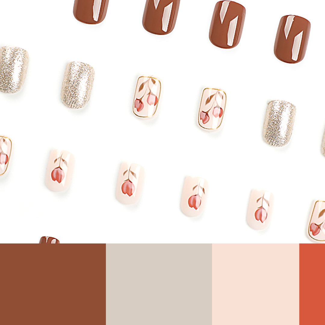 Artificial nail art with colorful flower design and glitter accents Kalsten
