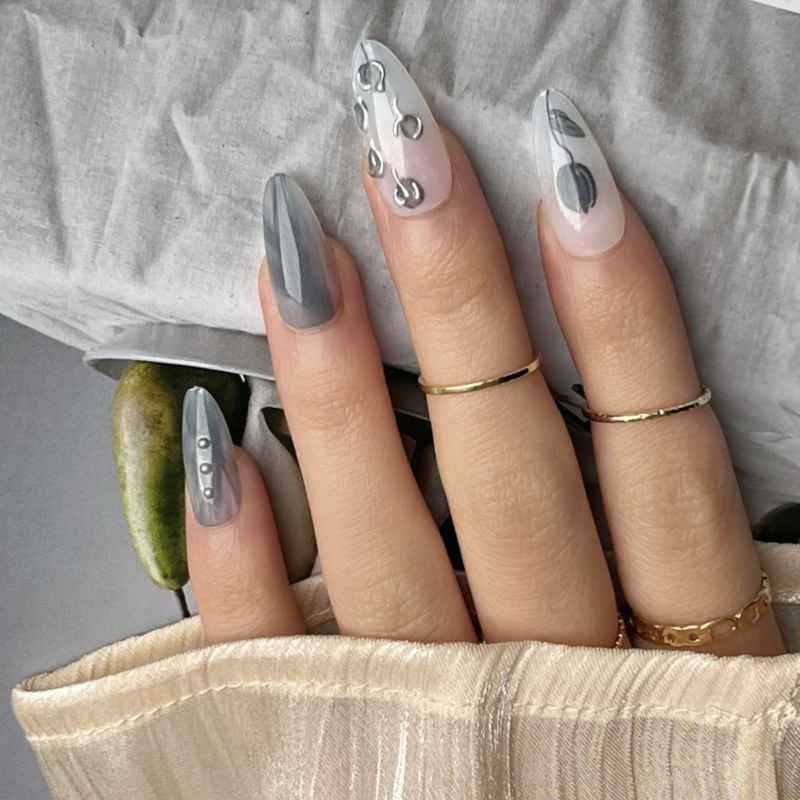 Artistic Stiletto Press-On Nail Design with Contemporary Accents Kalsten