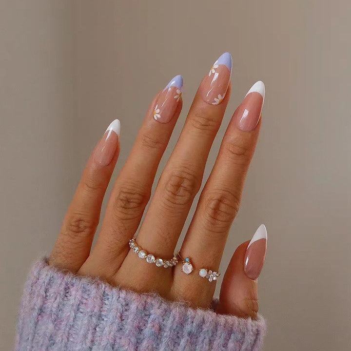 Elegant artificial nail design with delicate flower and ombre effects Kalsten