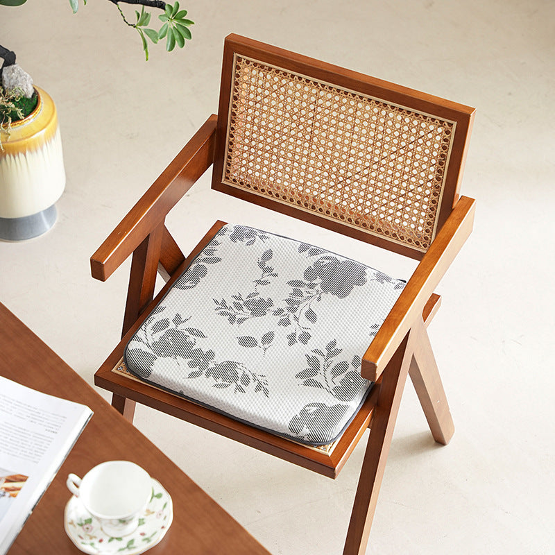 Padded seat cushion with ergonomic foam core and breathable mesh cover