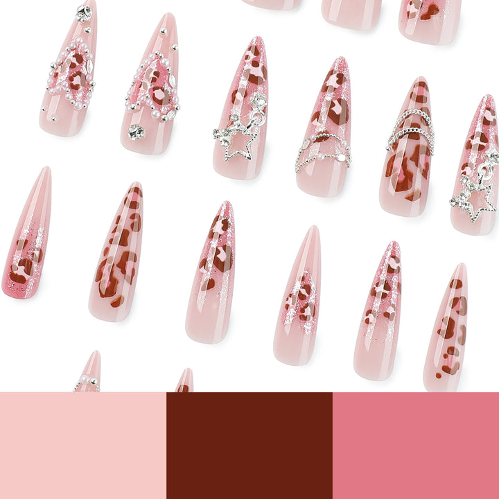 Artistic stiletto nails with glitter and jewelry accents Kalsten