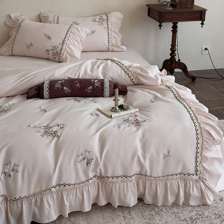 Bedding set made of cotton satin in vintage style with floral embroidery, ruffle and lace trim