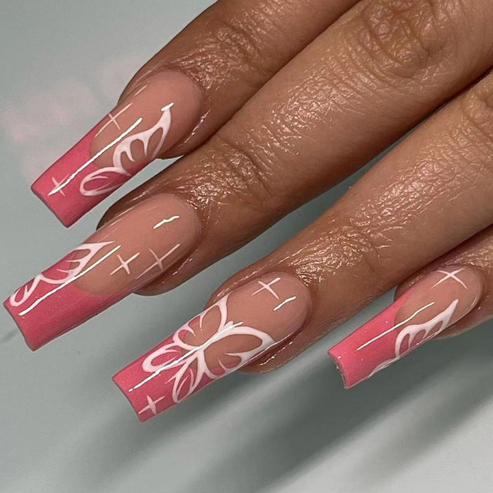 Artful stiletto nails with colorful butterfly design Kalsten