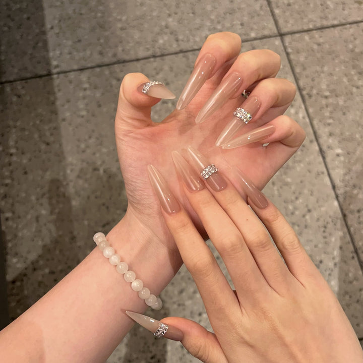 Stiletto Nail Art Tips with Rhinestone Accents Kalsten