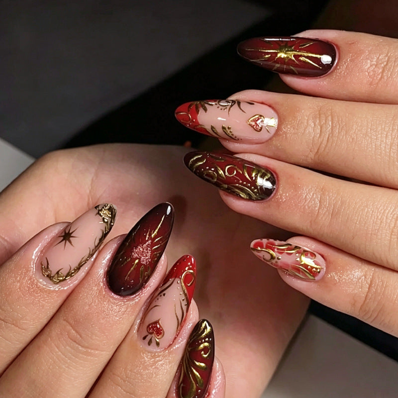 Decorative Press-On Nail Art Set with Intricate Gold Floral Design kalsten