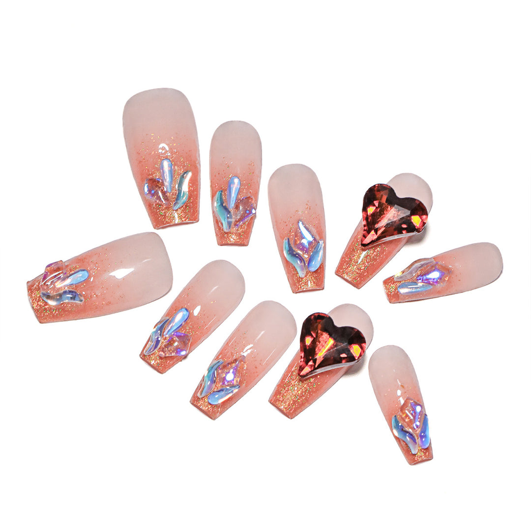 Artistic acrylic nails with heart design and sparkling accents Kalsten