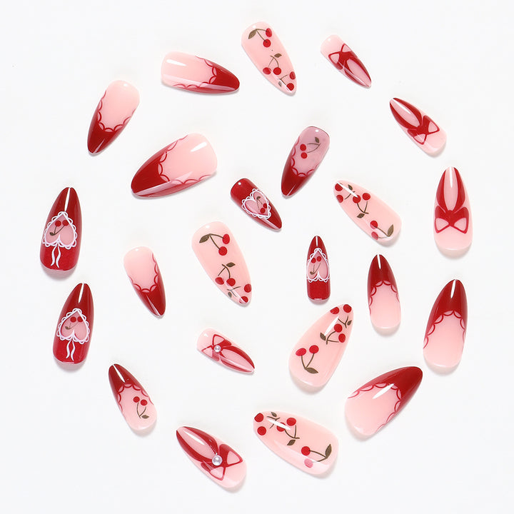 Creative nail set with romantic heart and bow accents Kalsten